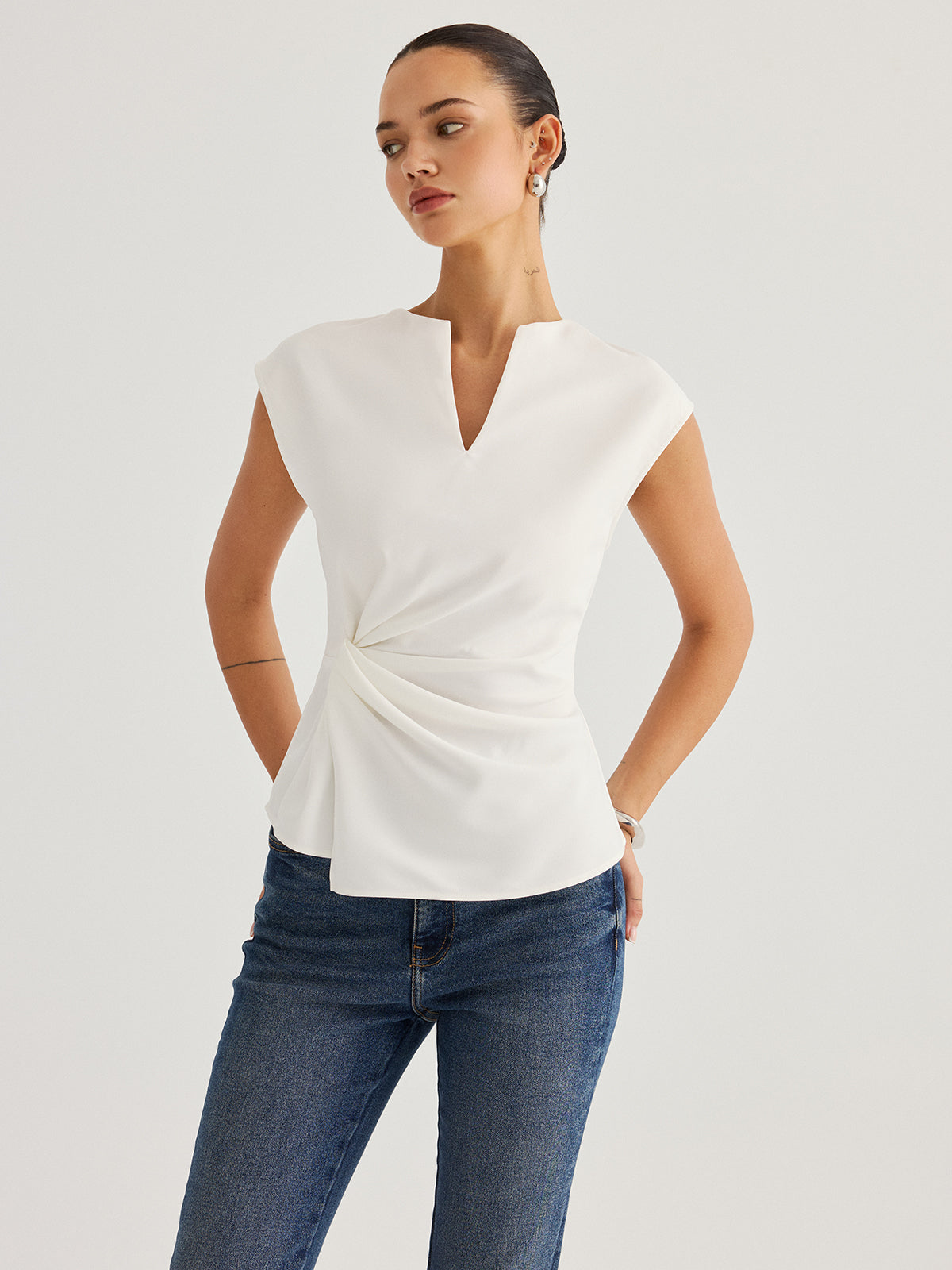 Sleeveless Twisted Waist Blouse
