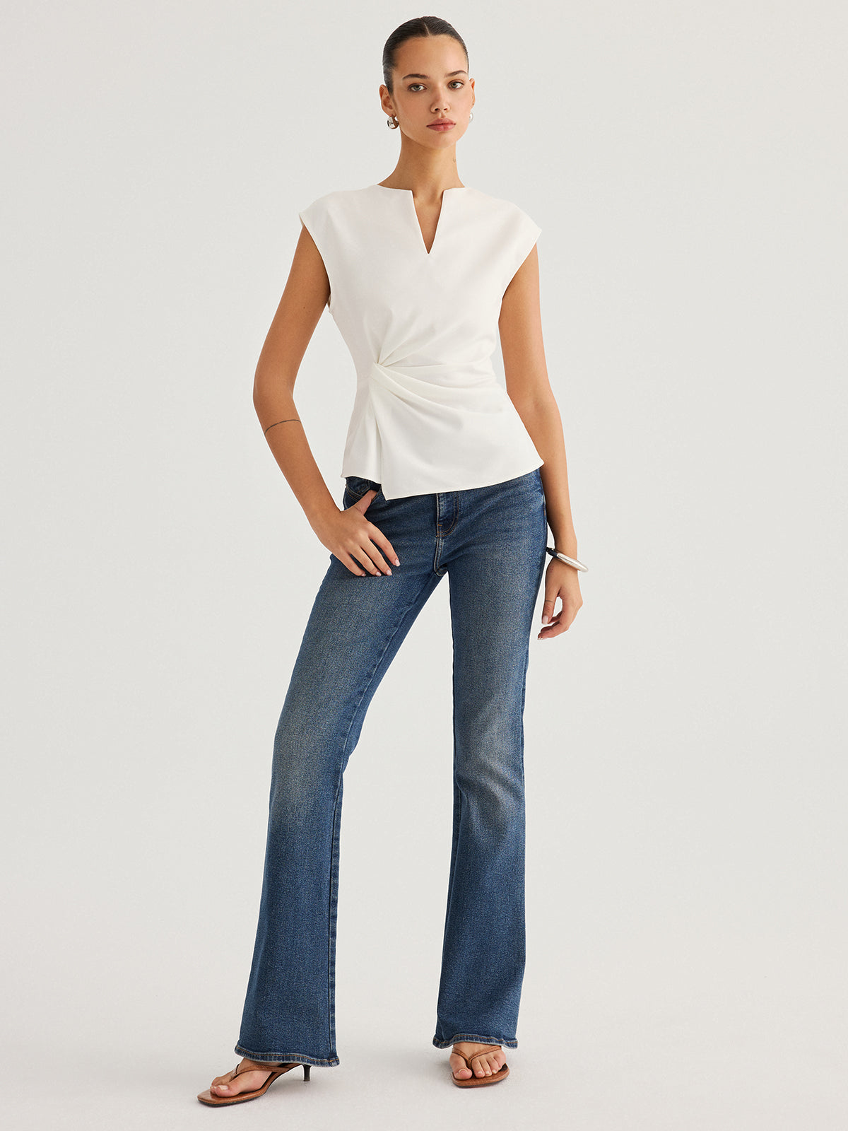 Sleeveless Twisted Waist Blouse
