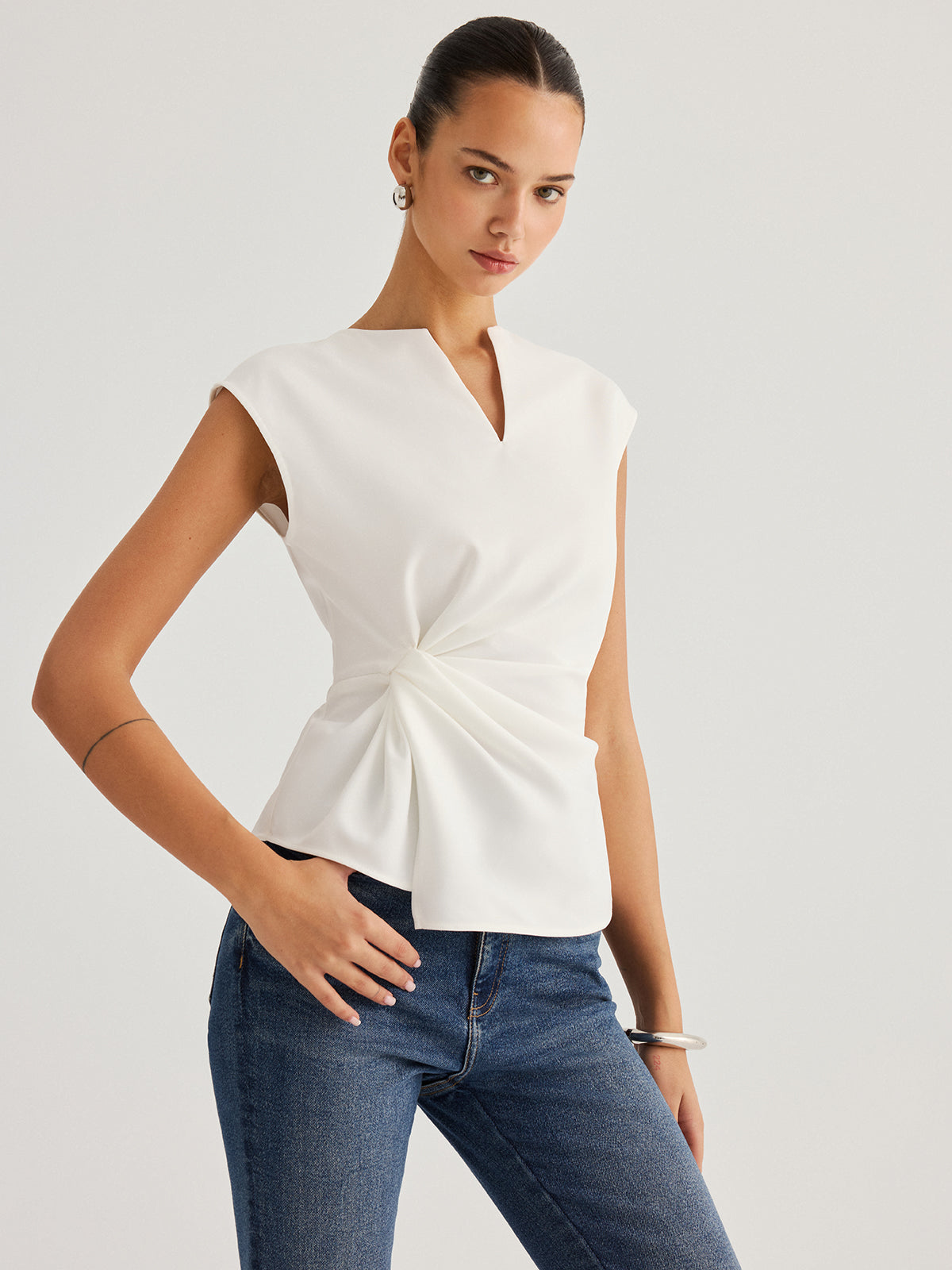 Sleeveless Twisted Waist Blouse