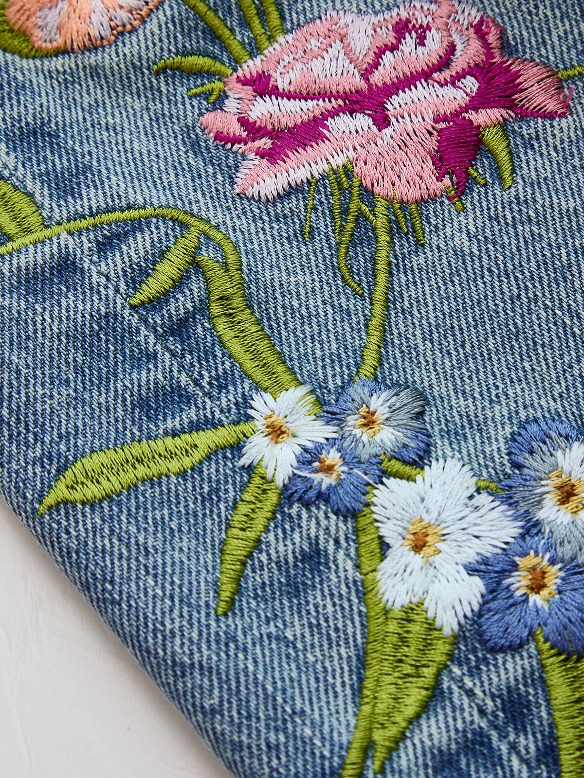 Floral Embroidery Curved-Leg Denim Pants